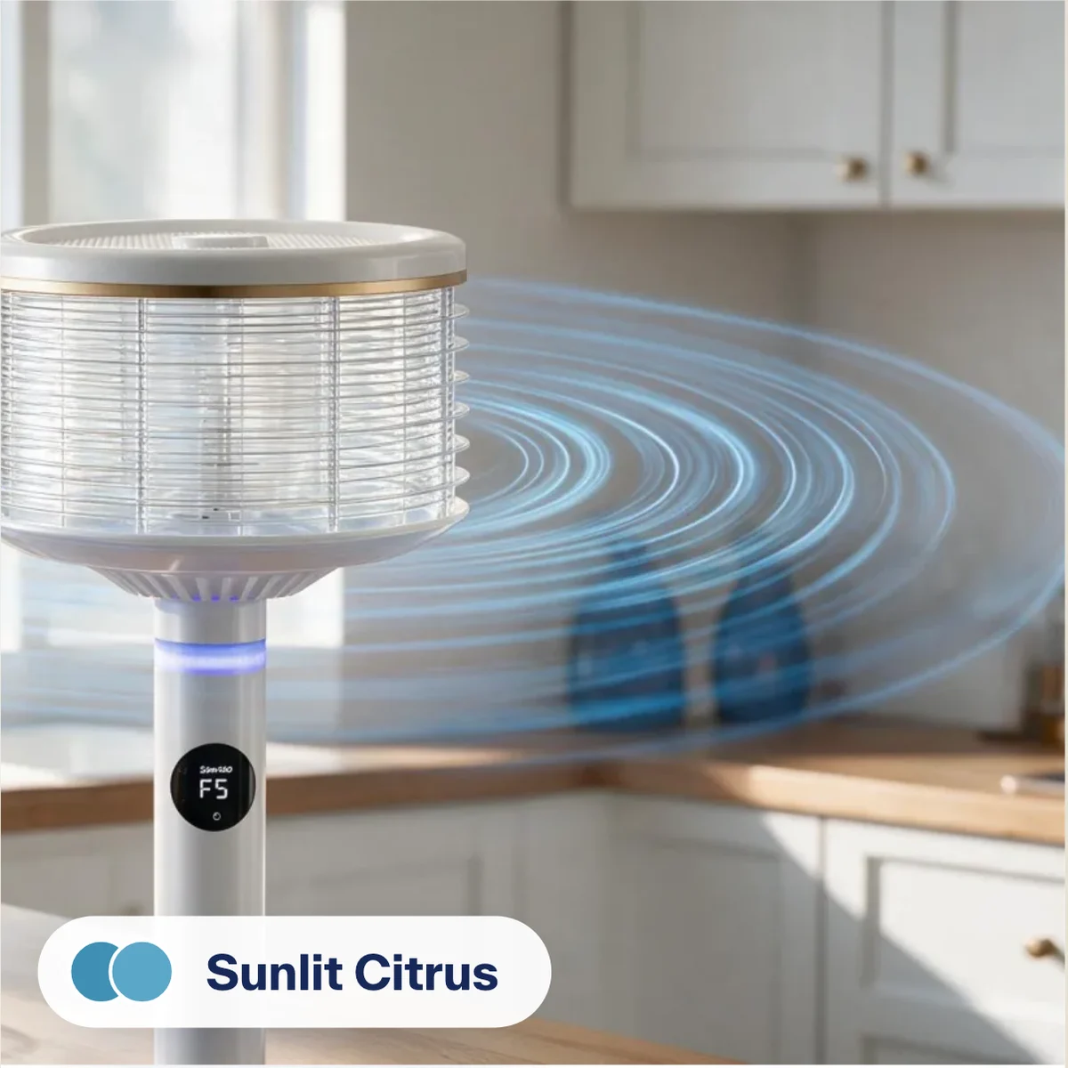 A white Spin360 in a bright kitchen by an open window, with lemons and a glass of lemon water. Label: Sunlit Citrus.
