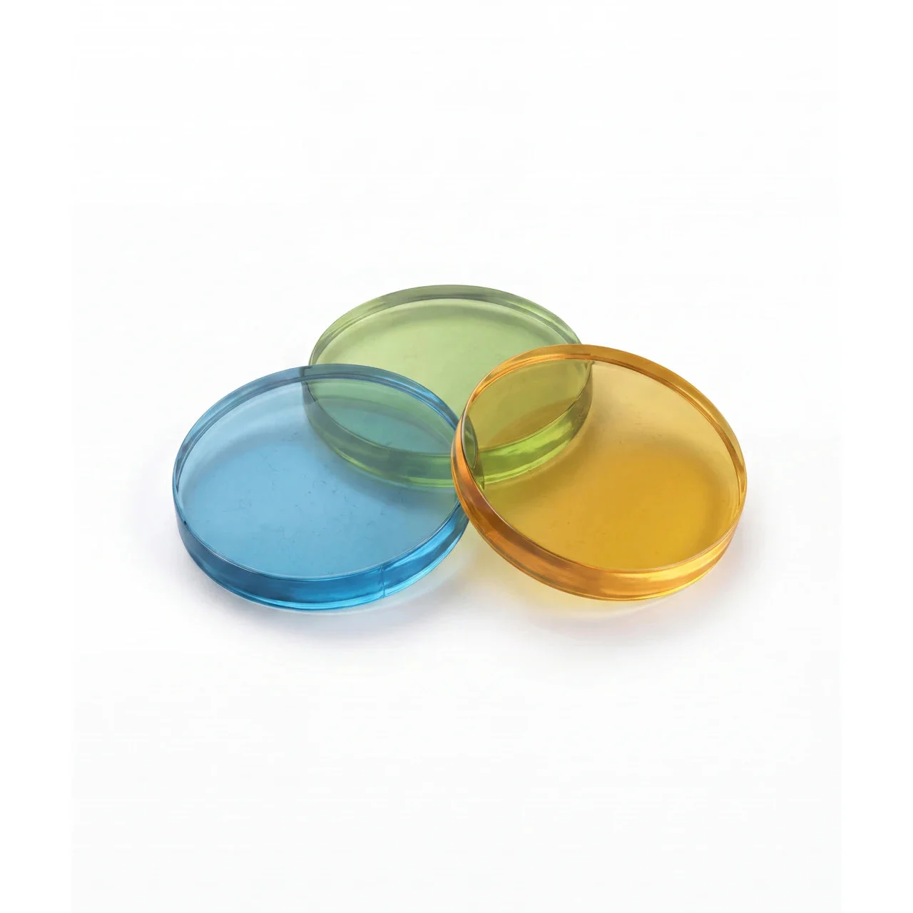 Three Spin360 scent pods, blue, green and amber, on white